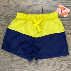 Primary sunshine and navy lined swimsuit, size 3-6 months. NWT